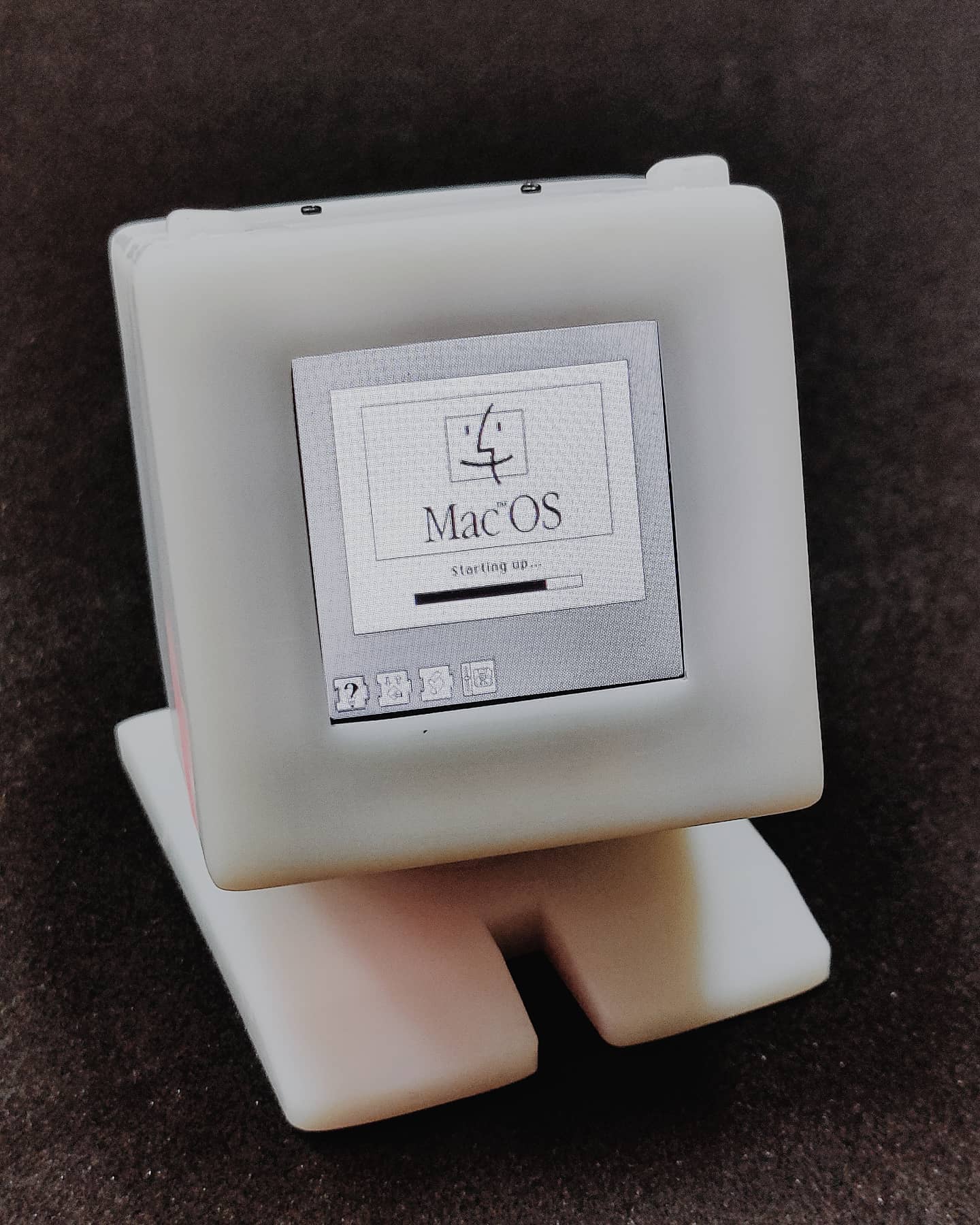 Micro Macintosh showing Mac OS boot screen